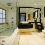 Modern bathroom with a jacuzzi tub in a suite on the Movenpick Royal Lily Nile Cruise