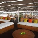 The shaded sun deck lounge on the Movenpick Royal Lily Nile Cruise perfect for relaxation and river viewing