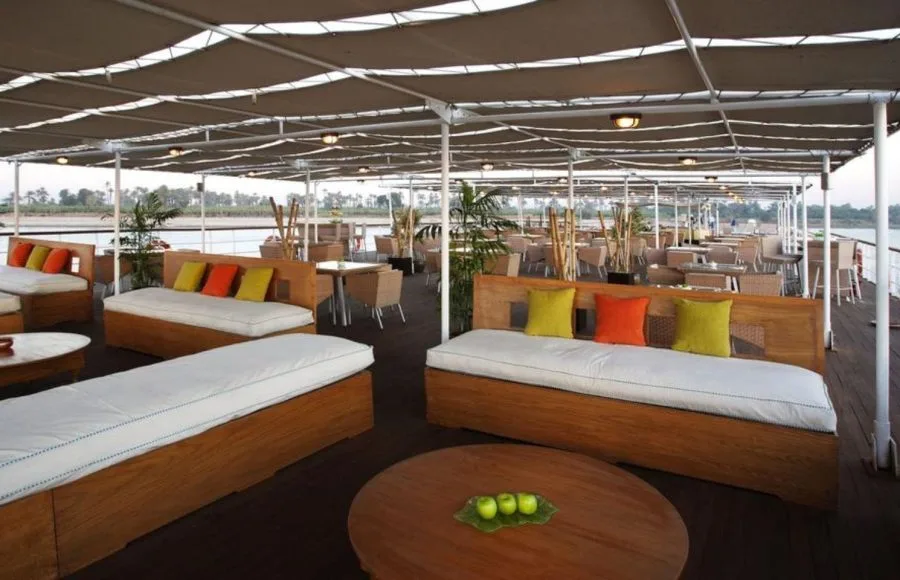 The shaded sun deck lounge on the Movenpick Royal Lily Nile Cruise perfect for relaxation and river viewing