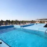 The refreshing swimming pools and sun loungers on the deck of the Movenpick Royal Lily Nile Cruise