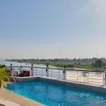 Swimming pool on the sundeck of the MS Royal Lotus Nile Cruise offering panoramic views of the Nile River as part of the Movenpick Royal Lotus Nile Cruise experience