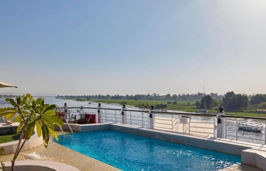 Swimming pool on the sundeck of the MS Royal Lotus Nile Cruise offering panoramic views of the Nile River as part of the Movenpick Royal Lotus Nile Cruise experience