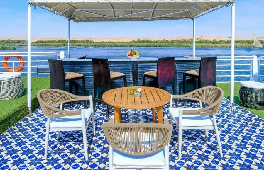 Movenpick MS Sunray sun deck bar area with seating overlooking the beautiful Nile River cruise.