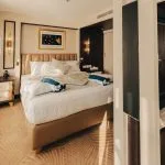 Luxury cabin with a king-sized bed and contemporary decor.