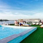 Guests enjoying the refreshing swimming pool and sun deck aboard the MS Nile Style Cruise Ship.
