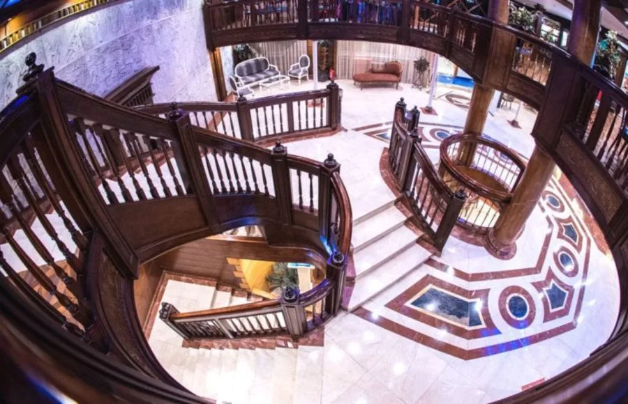 A top-down view of the main lobby and staircase on the Princess Sarah II Nile Cruise.