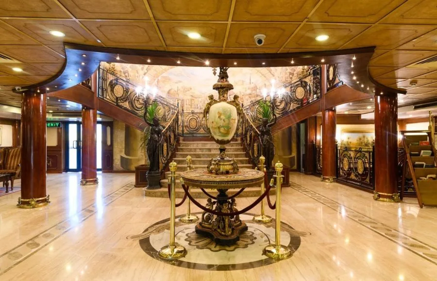 Lobby with a grand staircase on the MS Royal Princess Nile Cruise ship.