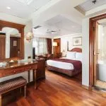 MS Royal Princess Nile Cruise suite with twin beds, desk area, and bathroom view.