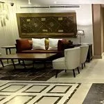 A luxurious lobby area on the MS Salima Nile Cruise ship, featuring modern furniture and stylish decor