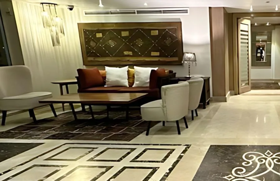 A luxurious lobby area on the MS Salima Nile Cruise ship, featuring modern furniture and stylish decor