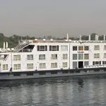 The majestic MS Salima Nile Cruise ship floats peacefully on the water, ready to begin its journey