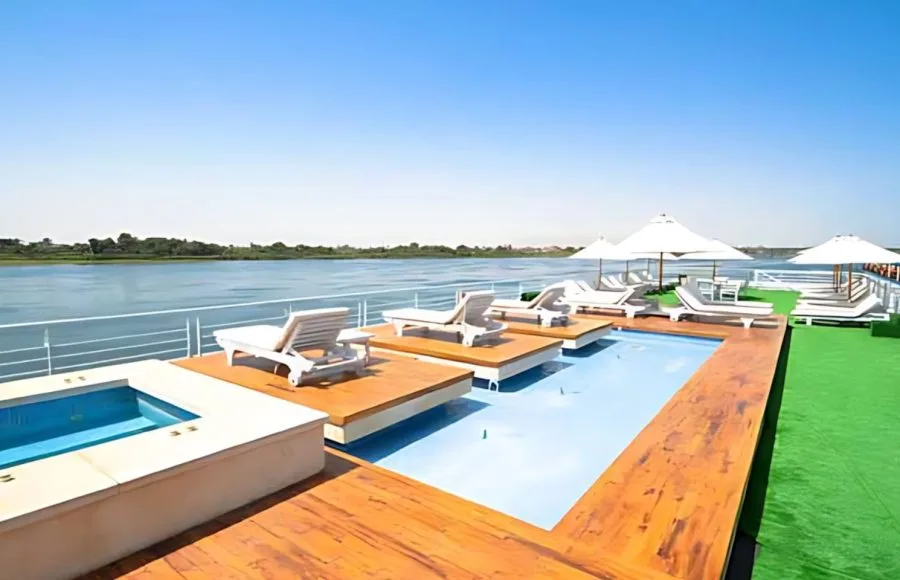 Take a refreshing dip in the pool on the sun deck of the MS Salima Nile Cruise while enjoying breathtaking views of the river