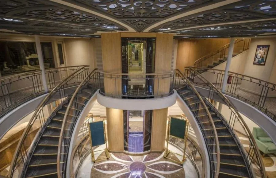 The entrance of the Sunrise MS Semiramis 1 Nile Cruise with a central elevator and staircases.