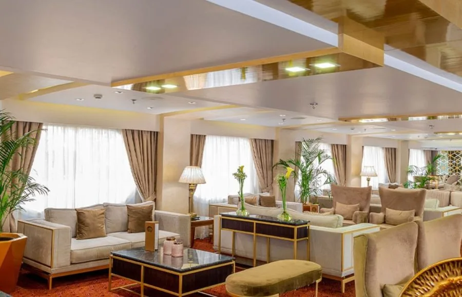 The elegant and spacious reception area on the Sonesta Sun Goddess Nile cruise ship, featuring comfortable sofas and stylish furnishings.