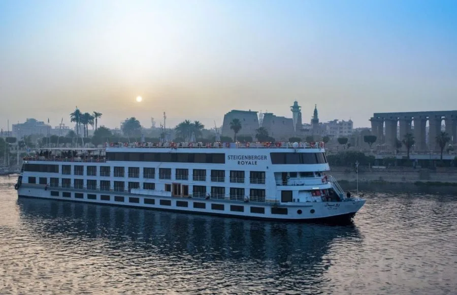 The Steigenberger Royale Nile Cruise ship on the river at sunset.