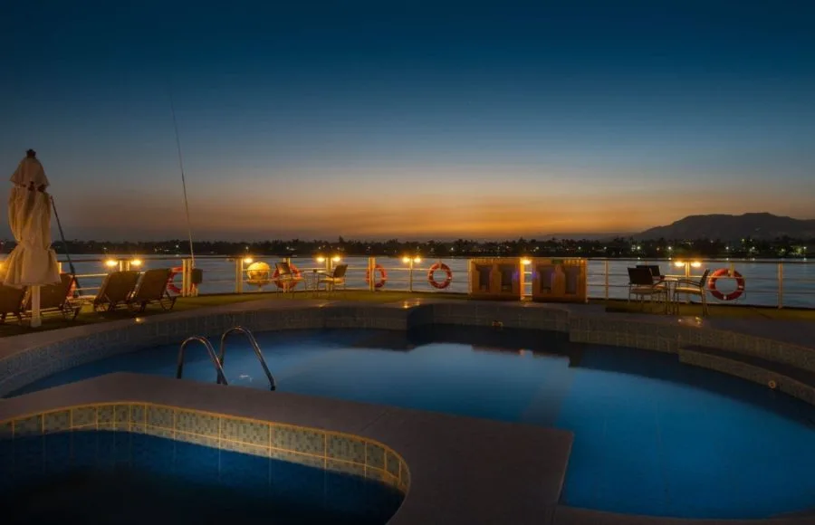 The swimming pool on the MS Steigenberger Royale at sunset.