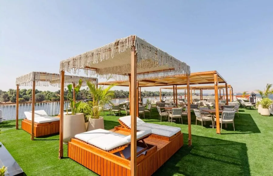Relax in style on the chic shaded day beds of the sun deck lounge aboard the incredible Tamr Henna Nile Cruise Ship while sailing Egypt's legendary river