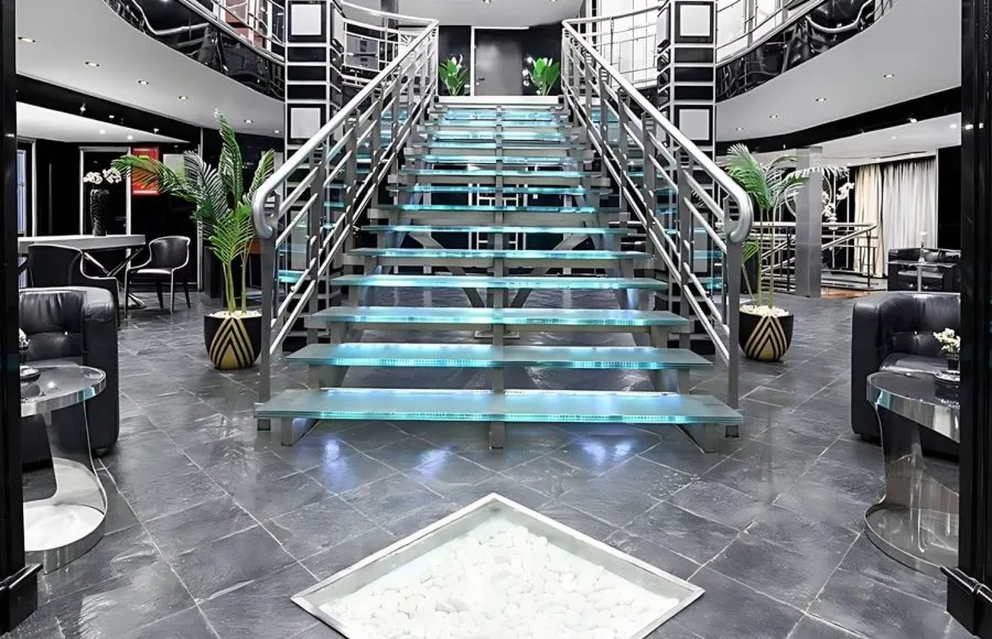 The elegant and spacious lobby of the H/S Moondance Nile cruise, featuring a welcoming reception desk, comfortable seating, and sophisticated decor for arriving guests.