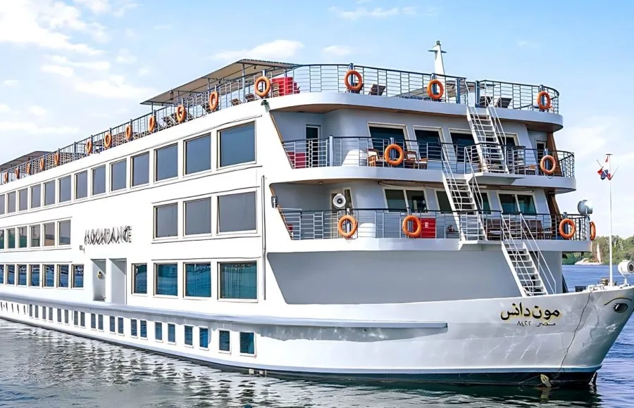 The elegant H/S Moondance Nile cruise ship, a luxurious vessel, gracefully sails on the serene waters of the Nile, offering an unparalleled travel experience.