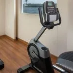 Stay active on your vacation with the fitness facilities aboard the Sindbad Nile Cruise, featuring exercise bikes and treadmills with scenic views.