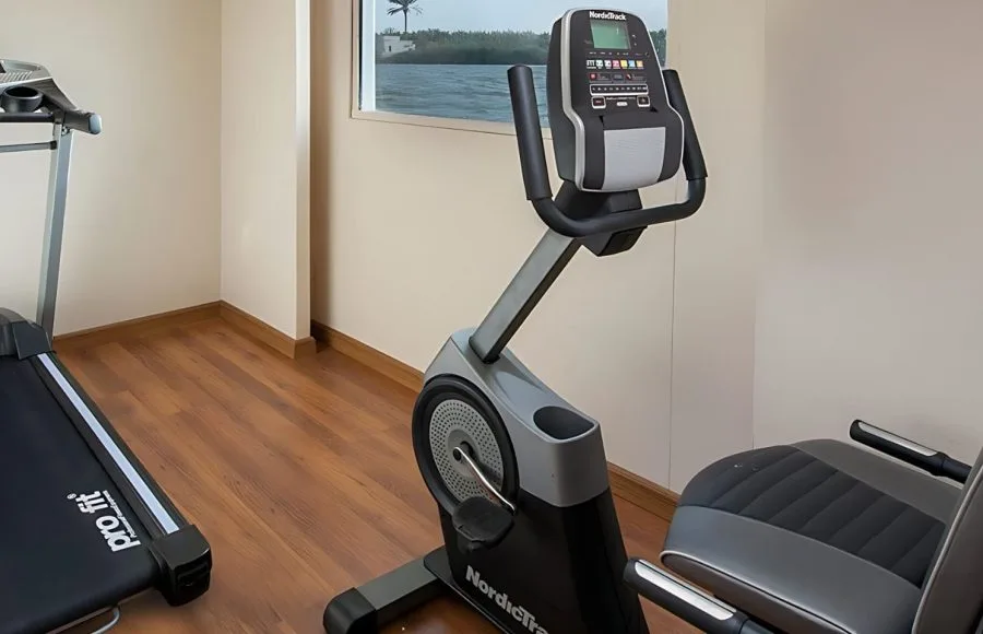 Stay active on your vacation with the fitness facilities aboard the Sindbad Nile Cruise, featuring exercise bikes and treadmills with scenic views.