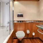 Luxurious bathroom on the Kon Tiki Nile cruise with a bathtub shower toilet and elegant sink
