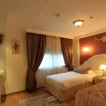 Twin beds in a Dahabiya Nile cruise cabin