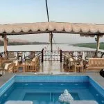 Sundeck and pool area on a traditional Dahabiya Nile cruise boat.