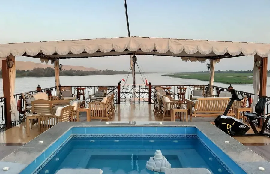 Sundeck and pool area on a traditional Dahabiya Nile cruise boat.