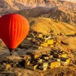 Hot-Air-Balloon-Above-The-Village-Of-Qurnet-Murai-In-Luxor