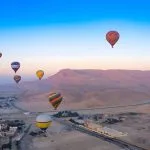 Hot-Air-Balloons-At-Sunrise-Over-The-Valley-Of-The-Kings