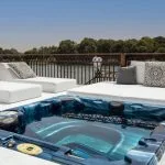 A sun deck with a hot tub on a Nile cruise boat.