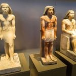 Ancient Egyptian statues on display, part of the Largest Archaeological Exhibition In Grand Egyptian Museum (GEM).