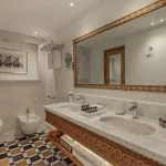 Luxurious bathroom on the Jaz Senator Nile Cruise with a double vanity.