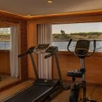 Gymnasium on the Jaz Senator Nile Cruise with a view of the Nile River.