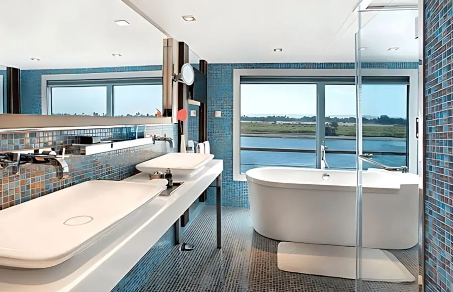 Contemporary bathroom with a standalone tub on the Oberoi Philae Luxury Nile Cruise.