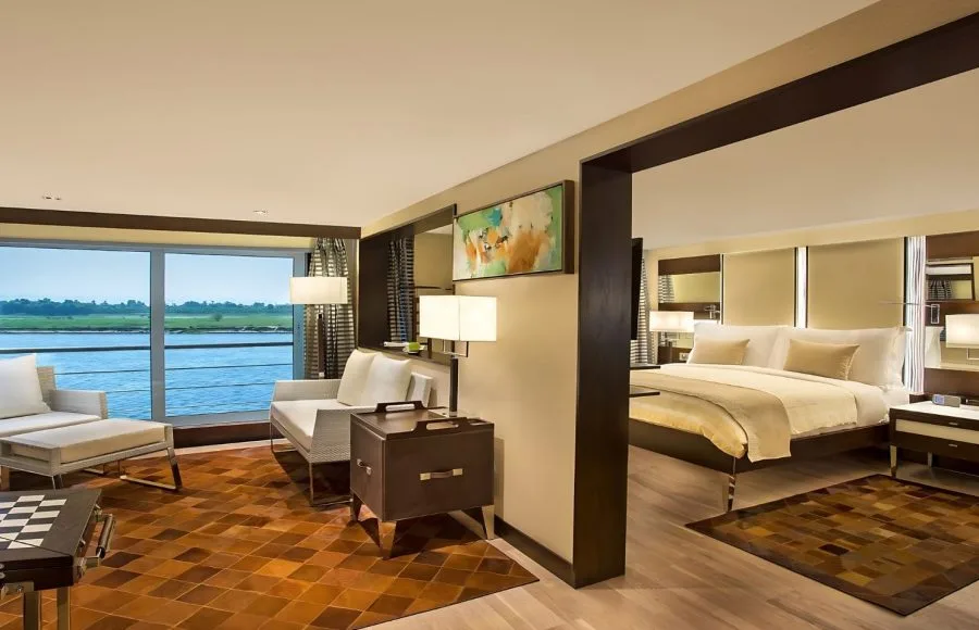 Spacious, luxurious suite with separate living areas, and a large window on the Oberoi Philae.