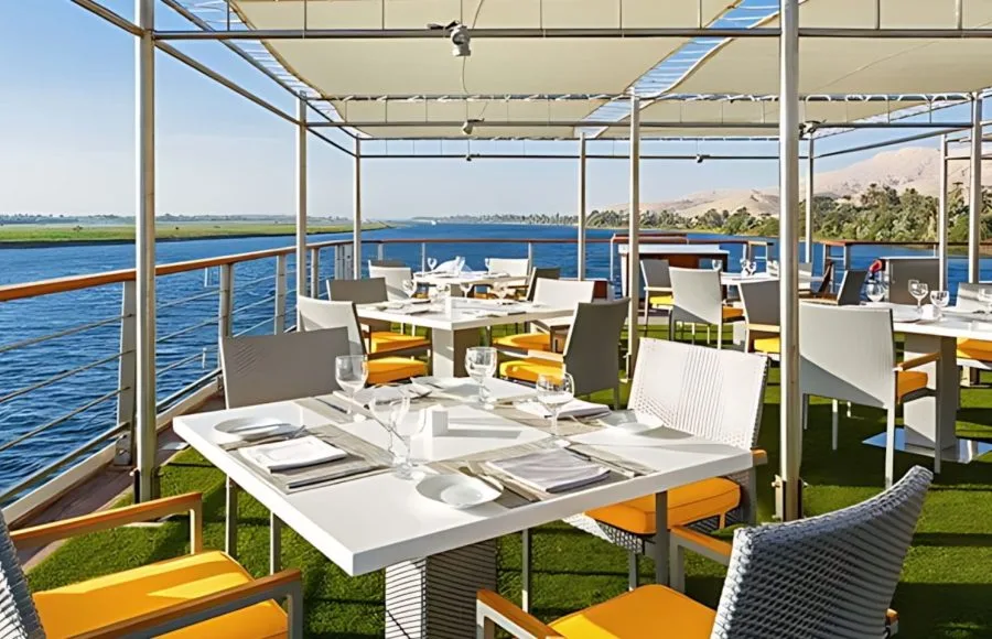 Covered outdoor restaurant on the sun deck on the Oberoi Philae Luxury Nile Cruise.