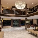 The expansive Lobby of the Oberoi Zahra with marble floors.