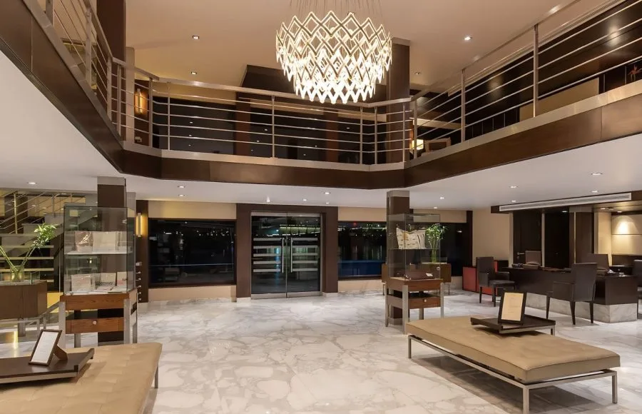 The expansive Lobby of the Oberoi Zahra with marble floors.