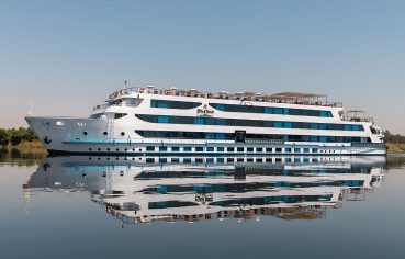 The sleek exterior of the Oberoi Zahra Nile Cruise ship on the Nile River.