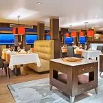 The chic Restaurant dining area on the Oberoi Zahra.