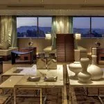 Lounge on the Sanctuary Nile Adventurer cruise ship with river views.