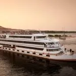 MS Sanctuary Nile Adventurer cruise ship sailing on the Nile River.