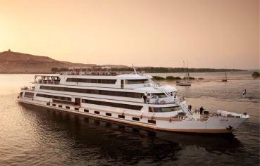 MS Sanctuary Nile Adventurer cruise ship sailing on the Nile River.