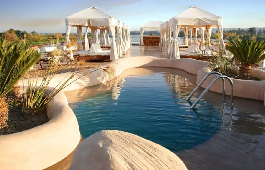 Unique shaped swimming pool and Sun Deck on Sanctuary Sun Boat III Luxury Nile Cruise.