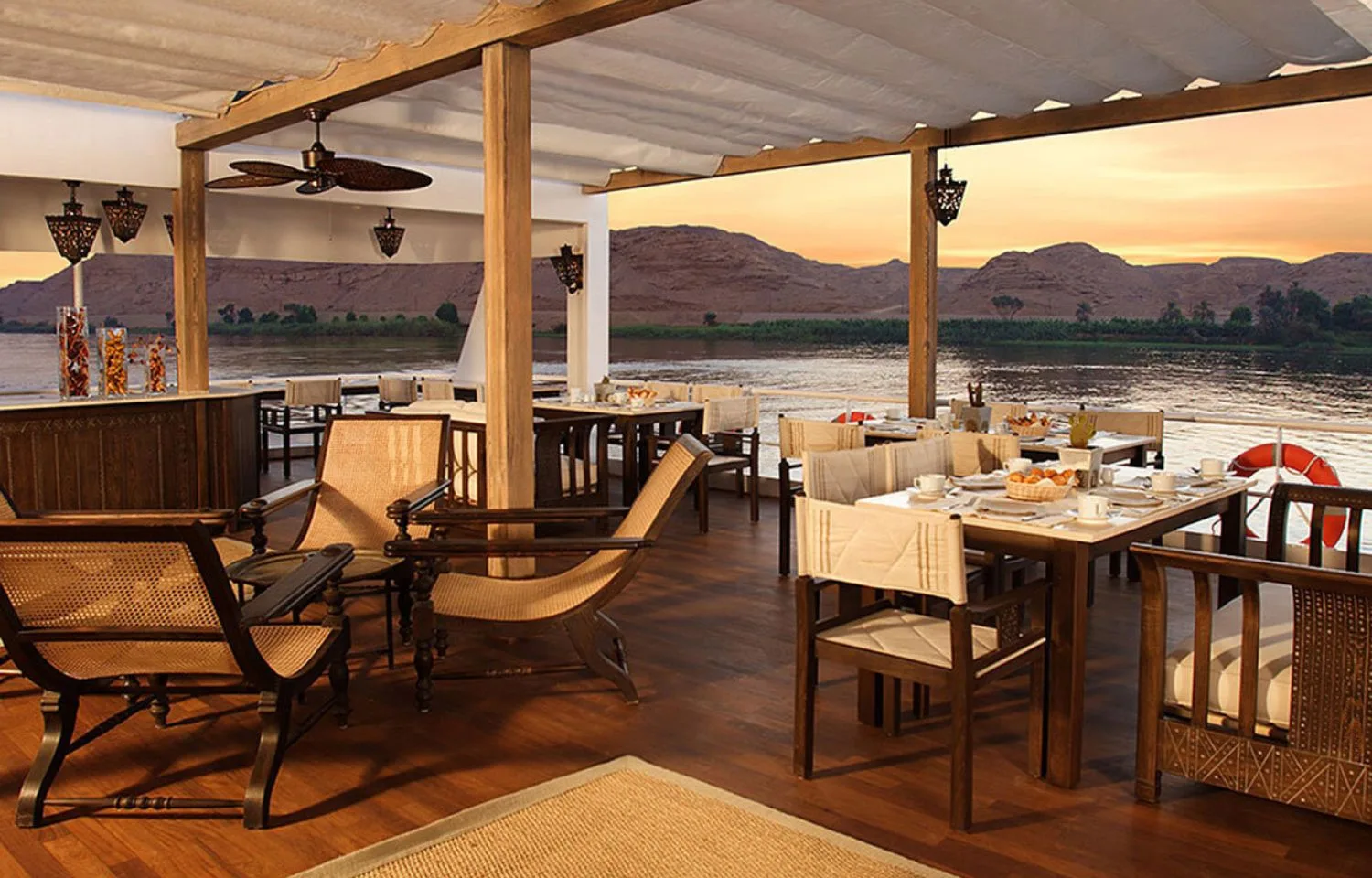 Enjoy open-air dining with breathtaking views on the sun deck of the Sun Boat III.
