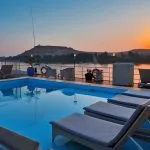 Sun deck pool and loungers on the Sanctuary Sun Boat IV Luxury Cruise.