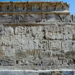 Medinet-Habu-wall-with-hieroglyphs-and-various-deities