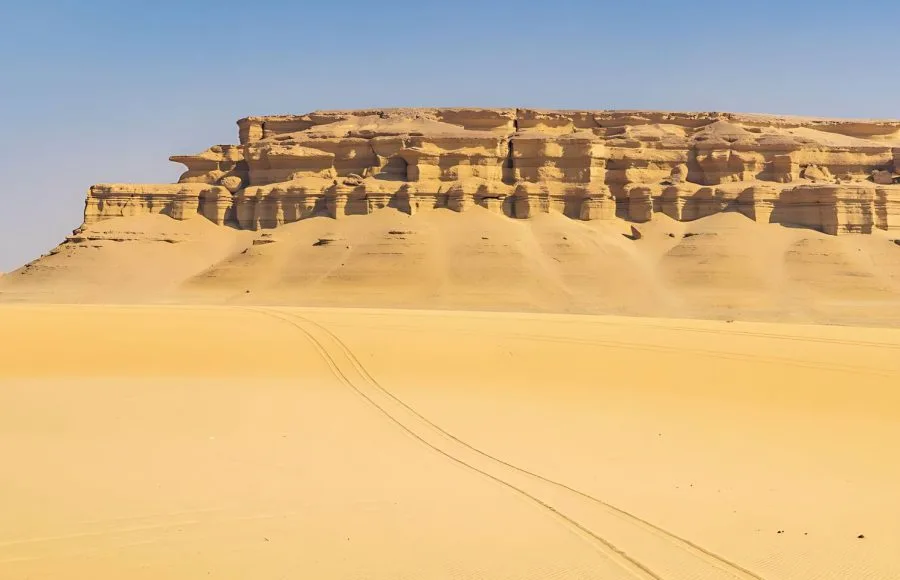 Sand-Below-Eroded-Cliffs-Wadi-Al-Hitan